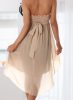 Lenge bézs színű pánt nélküli aszimmetrikus miniruha
