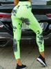 Alakformáló PUSH UP neonzöld mintás fitness leggings / cicanadrág (8096)